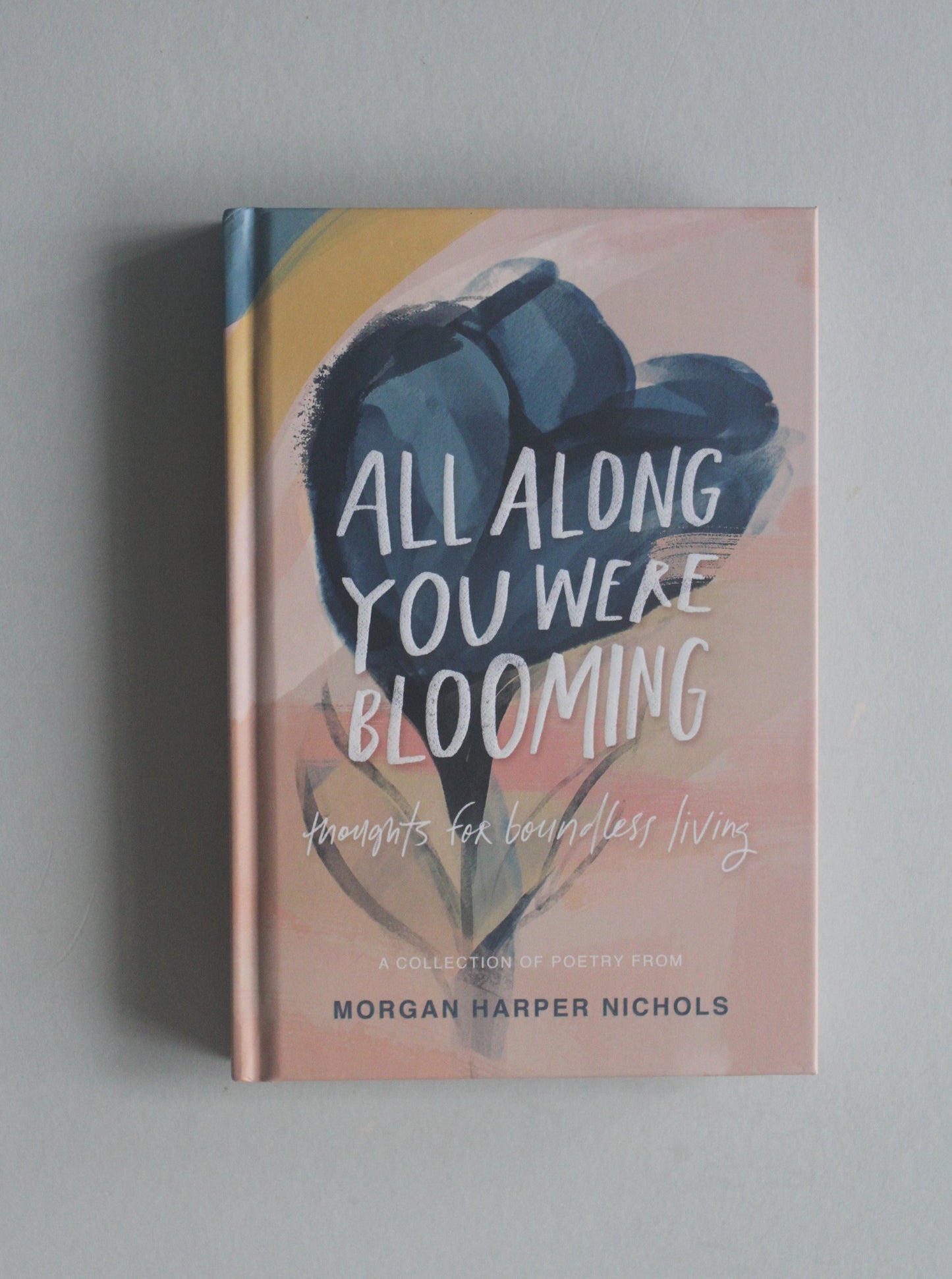 ALL ALONG YOU WERE BLOOMING